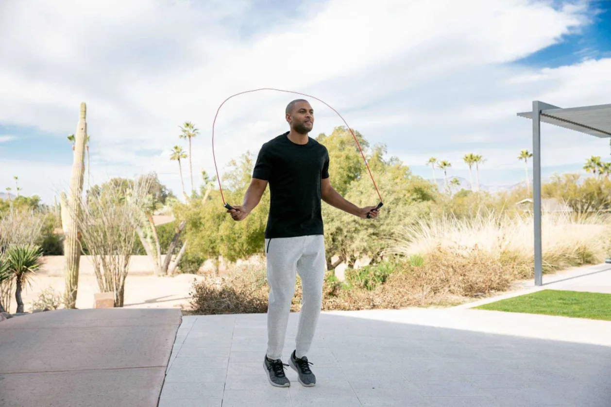 Man jumping rope at CIVANA on resort day pass